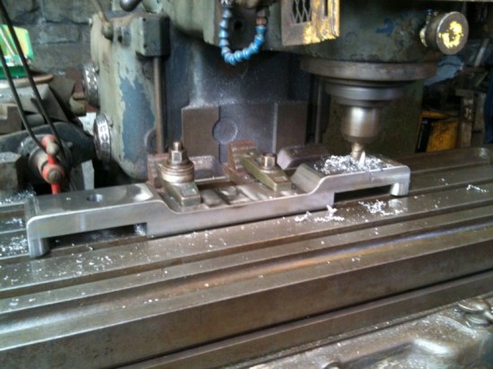 It was necessary to make a new under keep as one of the old ones broke in half when it was removed from the original frames. Here is a new one having the finishing touches machined on...